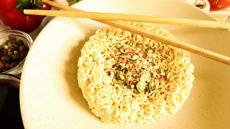 Instant noodles with king mushrooms, seasonings, soy sauce, peppers, green onions, tomatoes....