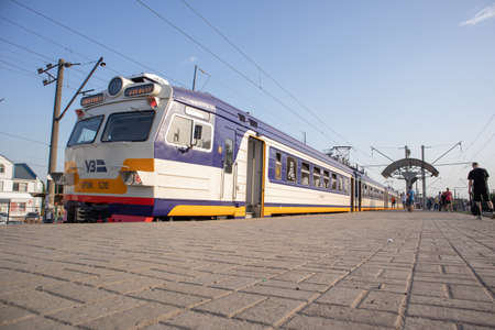 Electrical unit at the station. Passenger ring train. Kiev city train. A type of public transport in...