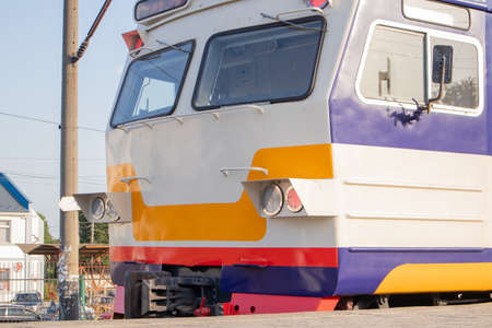 Electrical unit at the station. Passenger ring train. Kiev city train. A type of public transport in...