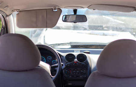 Damaged car window after an accident. Broken windshield as a result of an accident, inside view....