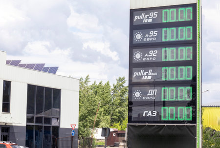 Fuel dispenser at a gas station in Ukraine with a price board showing the price of 0.00. Lack of fuel and gas. Ukraine, Kyiv - May 23, 2022のeditorial素材