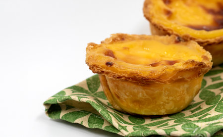 Lots of freshly baked desserts Pastel de nata or Portuguese egg tart. Pastel de Belm is a small pie...