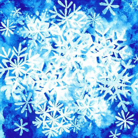 Watercolor winter background: lump of white snowflakes on blue paperの写真素材