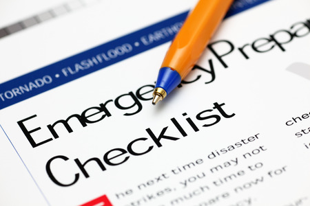 Emergency Checklist and ballpoint pen. Close-up.の写真素材