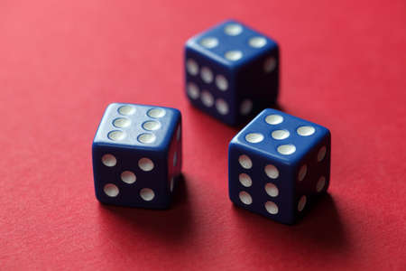 Three dices on red の写真素材