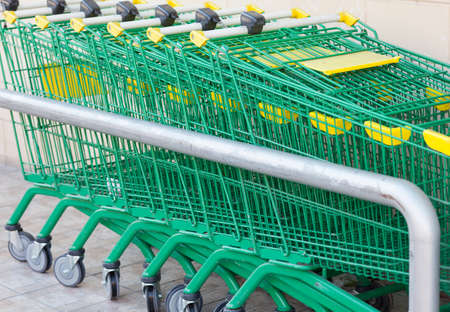 Shopping Trolleys locking in rowの写真素材