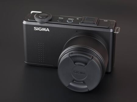 Tambov, Russian Federation - March 26, 2014 Camera Sigma DP3 Merrill on black background. Studio shot.のeditorial素材