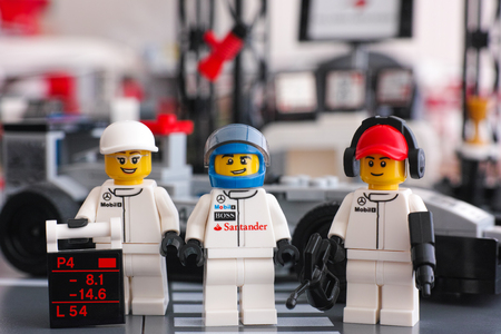 Tambov, Russian Federation - June 24, 2015 Lego McLaren Mercedes team crew members minifigures by LEGO Speed Champions opposite pit stop. Studio shot.のeditorial素材