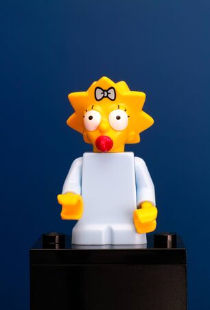 Tambov, Russian Federation - June 08, 2015 Lego Margaret Maggie Simpson minifigure on blue background. Studio shot.のeditorial素材