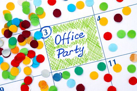 Reminder Office Party in calendar with confetti. Close-up.の写真素材