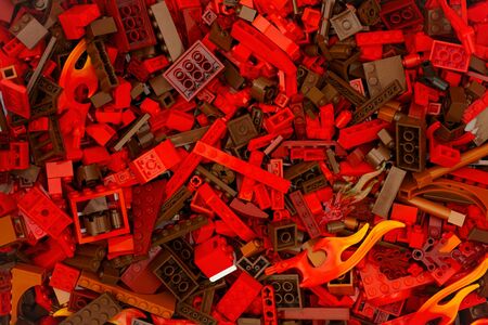 Tambov, Russian Federation - July 12, 2016 Background of red Lego blocks, bricks and pieces. Studio shot.のeditorial素材