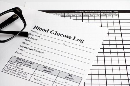 Blood Glucose Log and Monthly Blood Glucose Monitoring Diary forms with glasses. Black and white.の写真素材