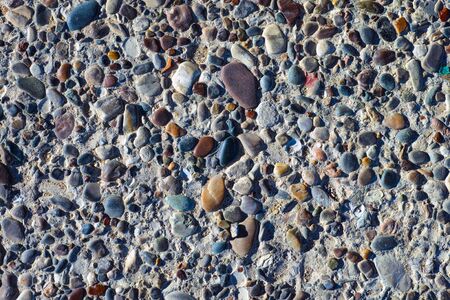 Background with stones and pebbles. Full frame.