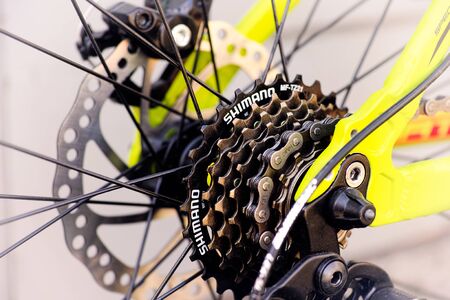 Tambov, Russian Federation - May 07, 2017 Shimano gear cassette on rear bicycle wheel.