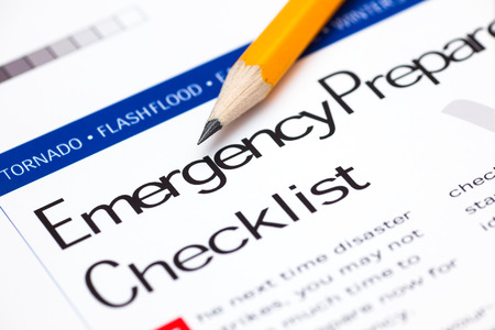 Emergency Preparedness Checklist with pencil. Close-up.の写真素材