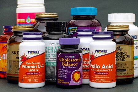 Tambov, Russian Federation - August 22, 2017 Bottles with vitamins and dietary supplement. Studio shot.のeditorial素材