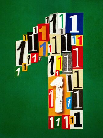 Number One made from numbers cutting from magazines on green background.