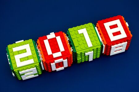 Tambov, Russian Federation - September 28, 2017 Lego New year 2018 concept with Lego cubes on blue background.のeditorial素材