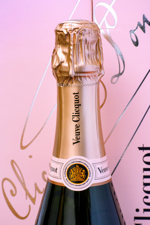 Tambov, Russian Federation - October 06, 2017 Top of Champagne Veuve Clicquot Rose Bottle against pink box. Studio shot.のeditorial素材