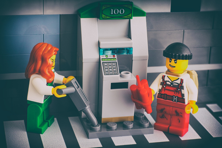 Tambov, Russian Federation - June 03, 2017 Lego thieves breaking ATM. Studio shot.のeditorial素材