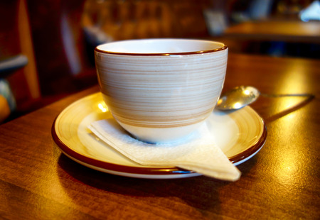 Coffee cup on the table in caffe.の写真素材