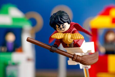 Tambov, Russian Federation - January 20, 2019 Lego Harry Potter on broom captured the Golden Snitch and win the Quidditch Match. Studio shot.のeditorial素材