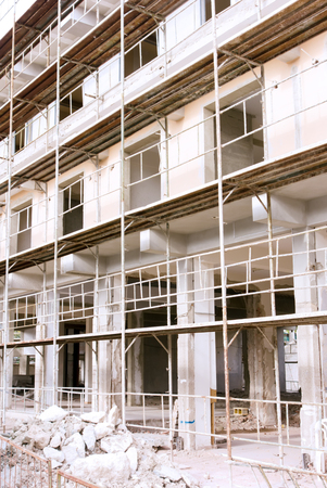 Building renovation. Scaffolding around building. Close up