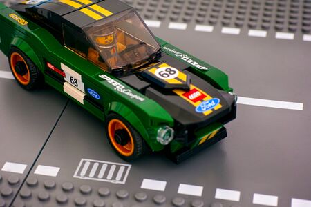 Tambov, Russian Federation - July 02, 2019 Lego 1968 Ford Mustang Fastback car by LEGO Speed Champions on road baseplates. Studio shot.のeditorial素材