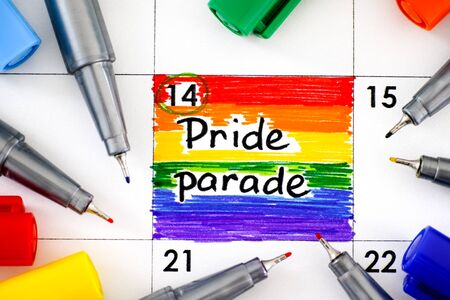 Reminder Pride Parade in calendar with colour pens. Close-up.の写真素材