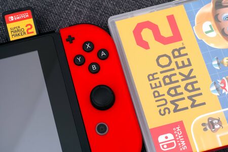 Tambov, Russian Federation - July 09, 2019  Super Mario Maker 2 video game box and Nintendo Switch...