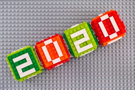 Tambov, Russian Federation - September 28, 2019 Lego New year 2020 concept. Lego cubes on gray baseplate background.のeditorial素材