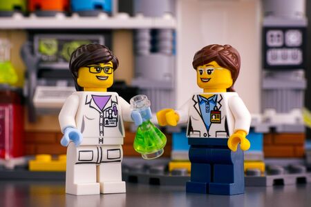 Tambov, Russian Federation - September 18, 2019 Two Lego scientist minifigures in laboratory. Studio shot.のeditorial素材