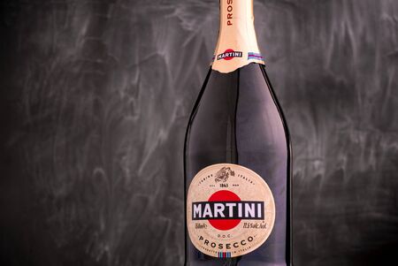 Tambov, Russian Federation - September 07, 2019 Martini Prosecco Bottle against black background.のeditorial素材