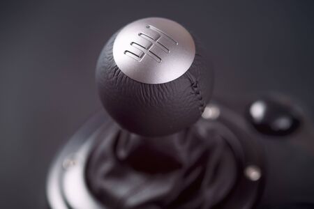 Close-up of gearbox shifter. Black background.の写真素材