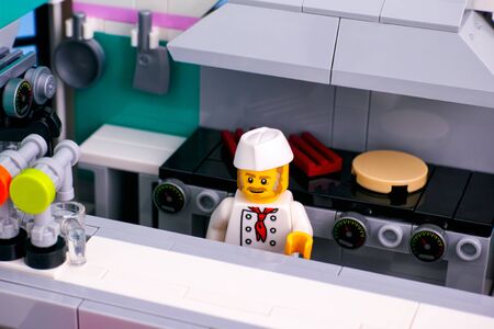 Tambov, Russian Federation - January 22, 2020 Lego Downtown Diner. Chef on open-plan kitchen. Studio...