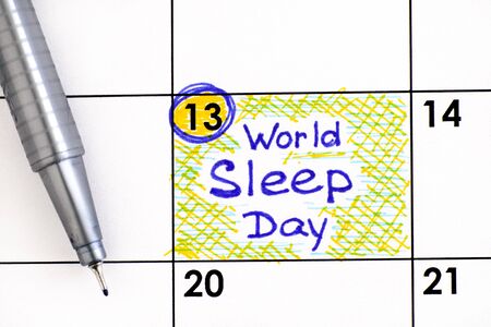 Reminder World Sleep Day in calendar with pen. March 13.の写真素材