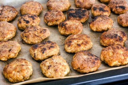 Baking tray with cutlets. Close-upの写真素材