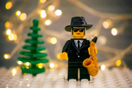 Tambov, Russian Federation - January 17, 2021 Lego Jazz Musician minifigure with saxophone against...