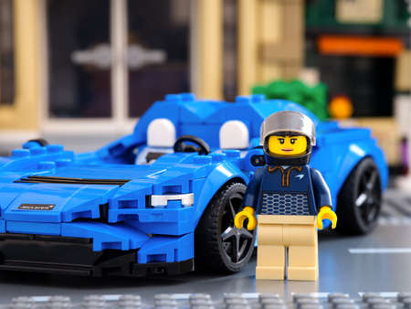 Tambov, Russian Federation - July 02, 2021 Lego driver minifigure near her car McLaren Elva by LEGO Speed Champions.のeditorial素材