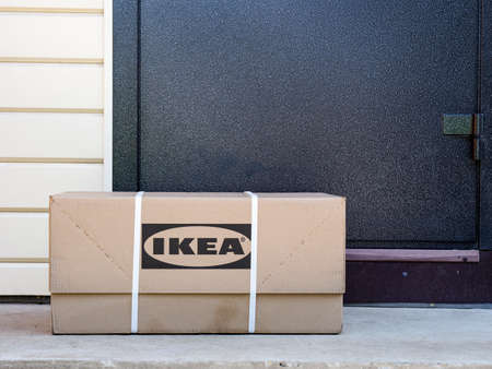 Tambov, Russian Federation - July 08, 2021 Ikea cardboard box delivered to the house door.