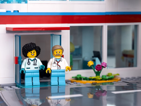 Tambov, Russian Federation - February 11, 2022 Two Lego doctor minifigures standing at the entrance of a hospitalのeditorial素材