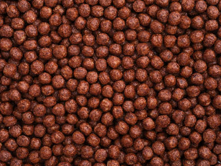 A background of chocolate cereal. Full frame