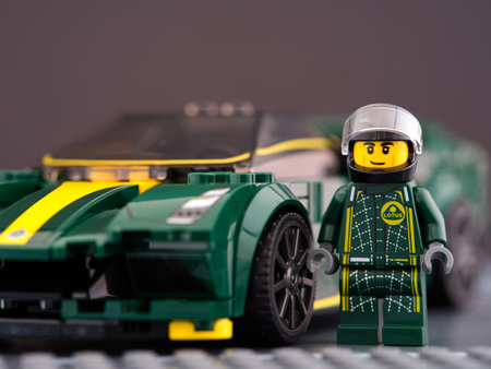 Tambov, Russian Federation - June 21, 2022 A Lego Lotus Evija car by LEGO Speed Champions and its driver minifigure near.のeditorial素材