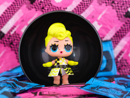 Tambov, Russian Federation - October 02, 2022 A LOL Surprise Dance Dance Dance doll in the one half of its packaging against a magenta paper backgroundのeditorial素材