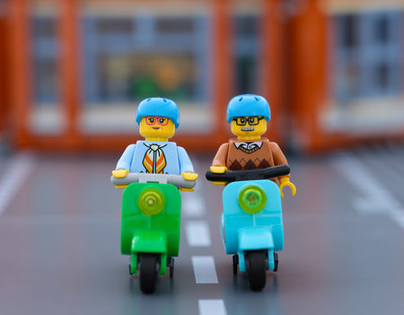 Tambov, Russian Federation - July 21, 2024 Lego senior man and senior woman minifigures riding...