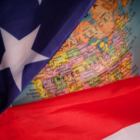 The flag of the United States covering North America on a globe.の写真素材