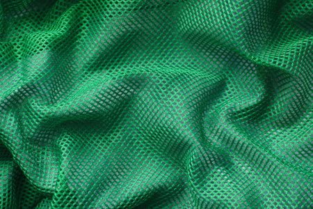 Crumpled green mesh textile backgroundの写真素材