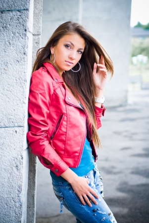 Young beautiful fashion woman in cityの写真素材