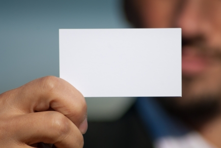 Man holding blank business cardの写真素材