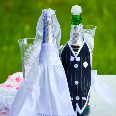 Wedding ceremony details of decorated wine bottlesの写真素材